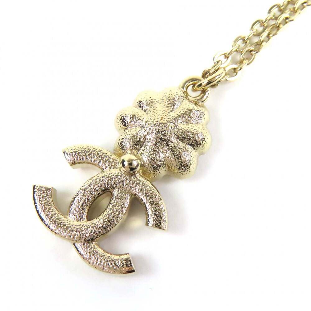 CHANEL Gold Pearl Logo Necklace - Picture 5 of 8